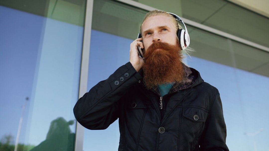 Finnish male broadcast director with beard and headset