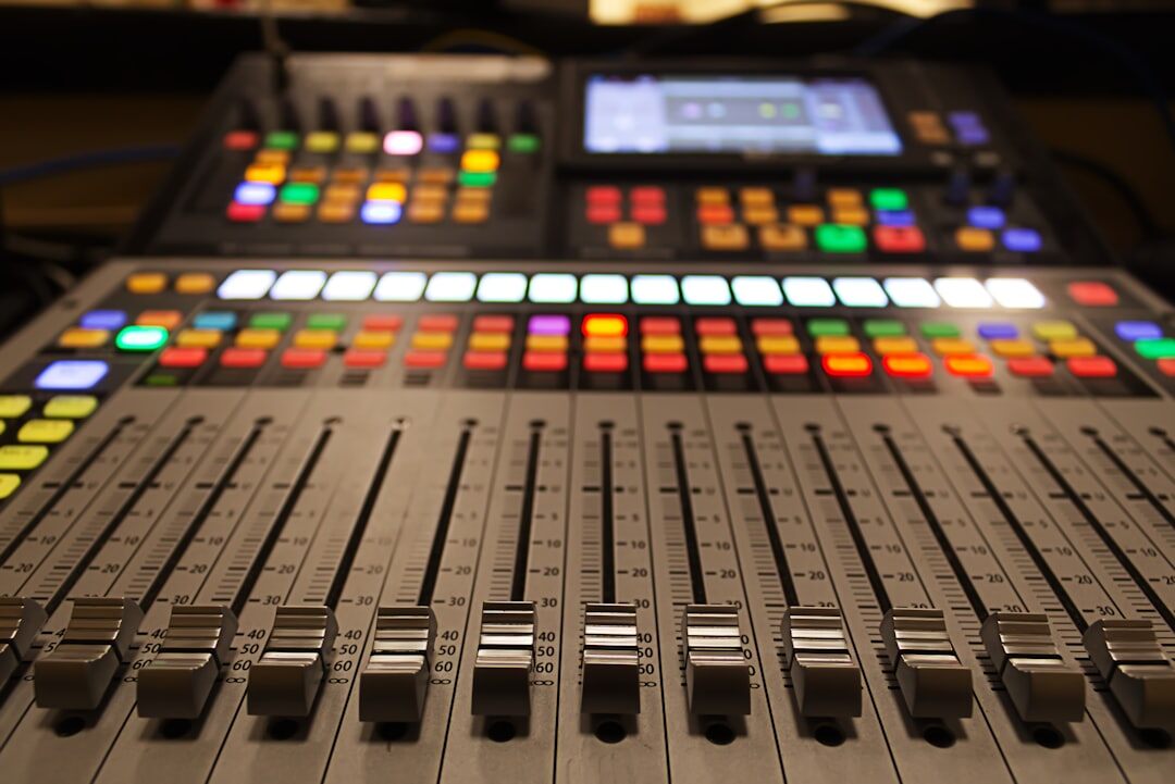 Television broadcast control room with multiple monitors and a video switcher